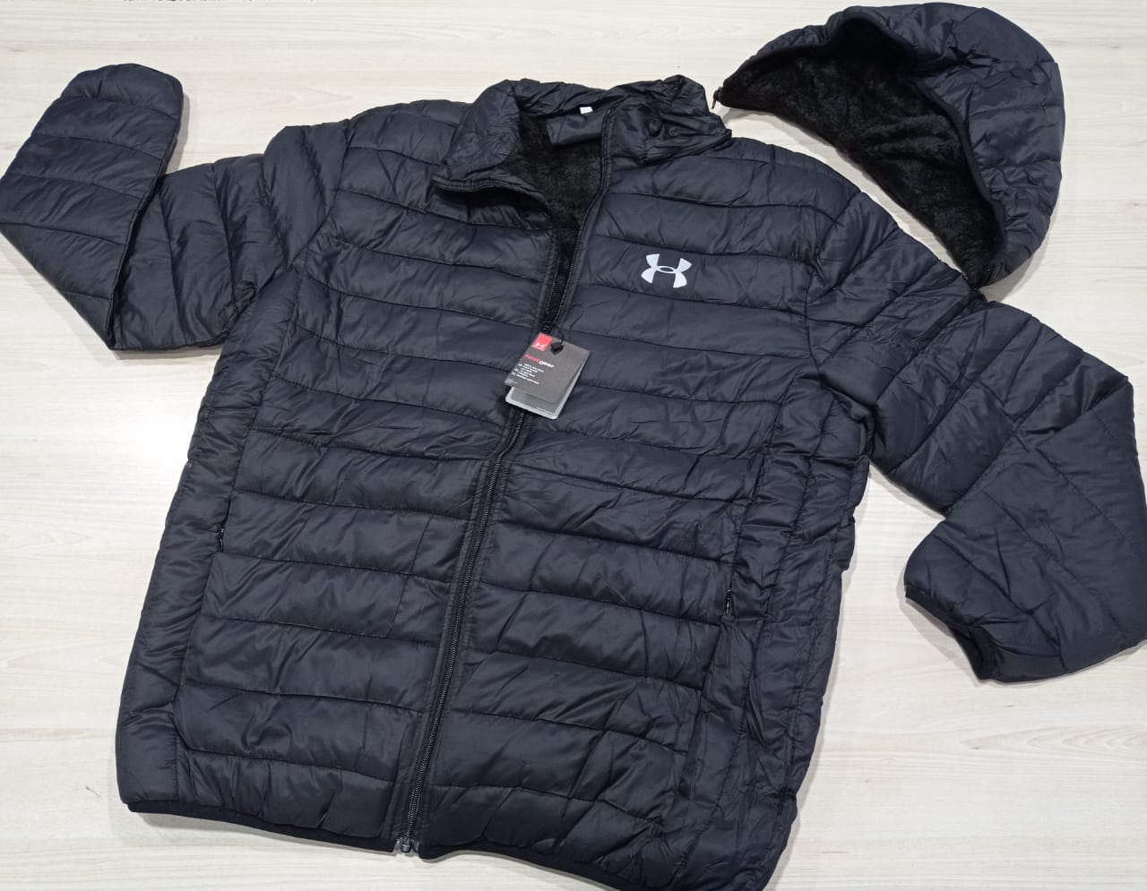 CAMPERA INFLABLE UNDER ARMOUR, TALLES